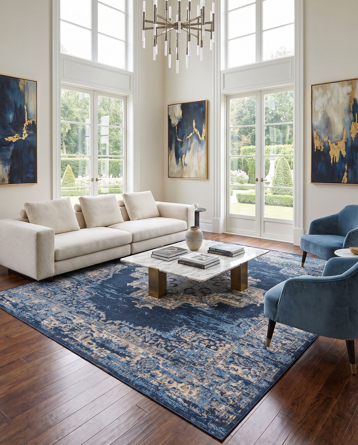 Amsterdam AMS-1025 Hand Woven Rug styled in an elegant designer living room — hand woven traditional area rug in taupe, beige, tan and blue tones