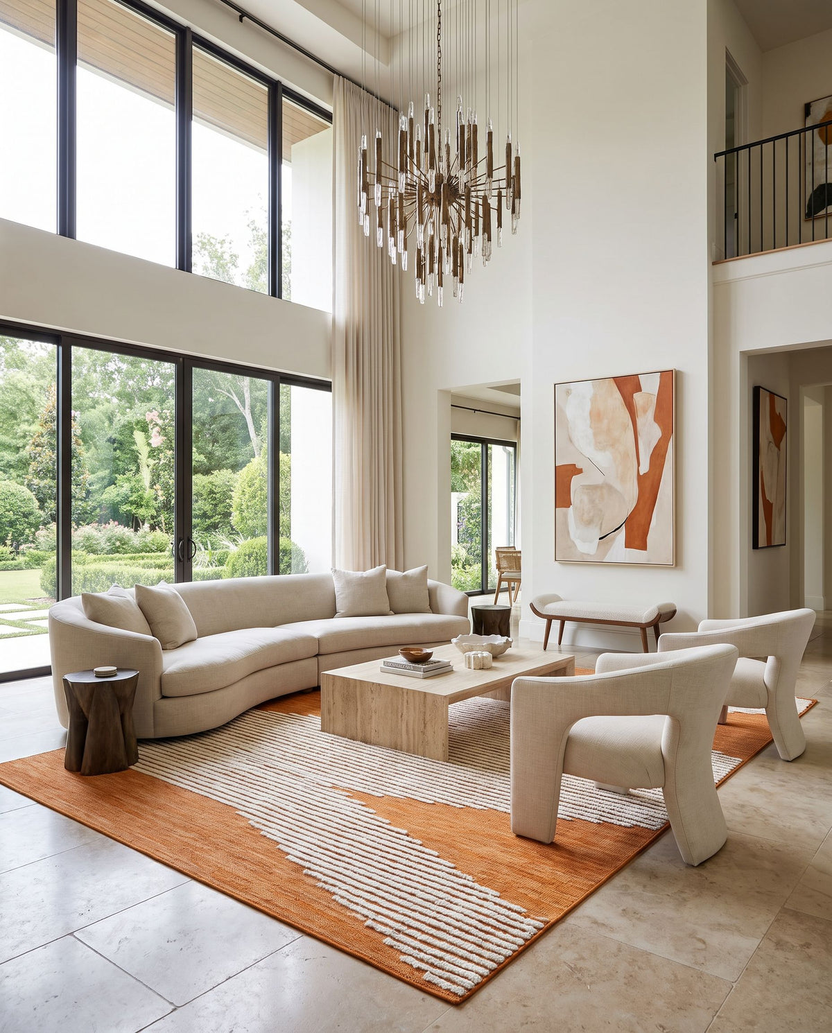 Apache APA-2309 Hand Woven Rug as the centerpiece of a bright luxury living room — a hand woven global area rug in cider, cinnamon and cream tones