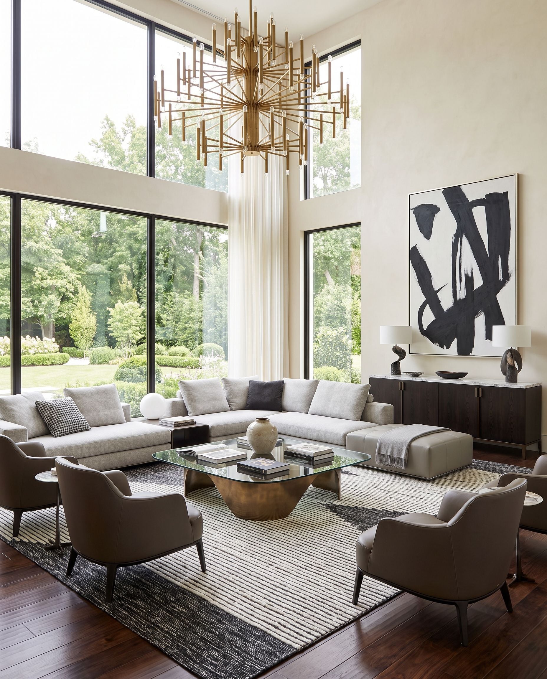 Apache APA-2311 Hand Woven Rug as the centerpiece of a bright luxury living room — a hand woven global area rug in black and cream tones