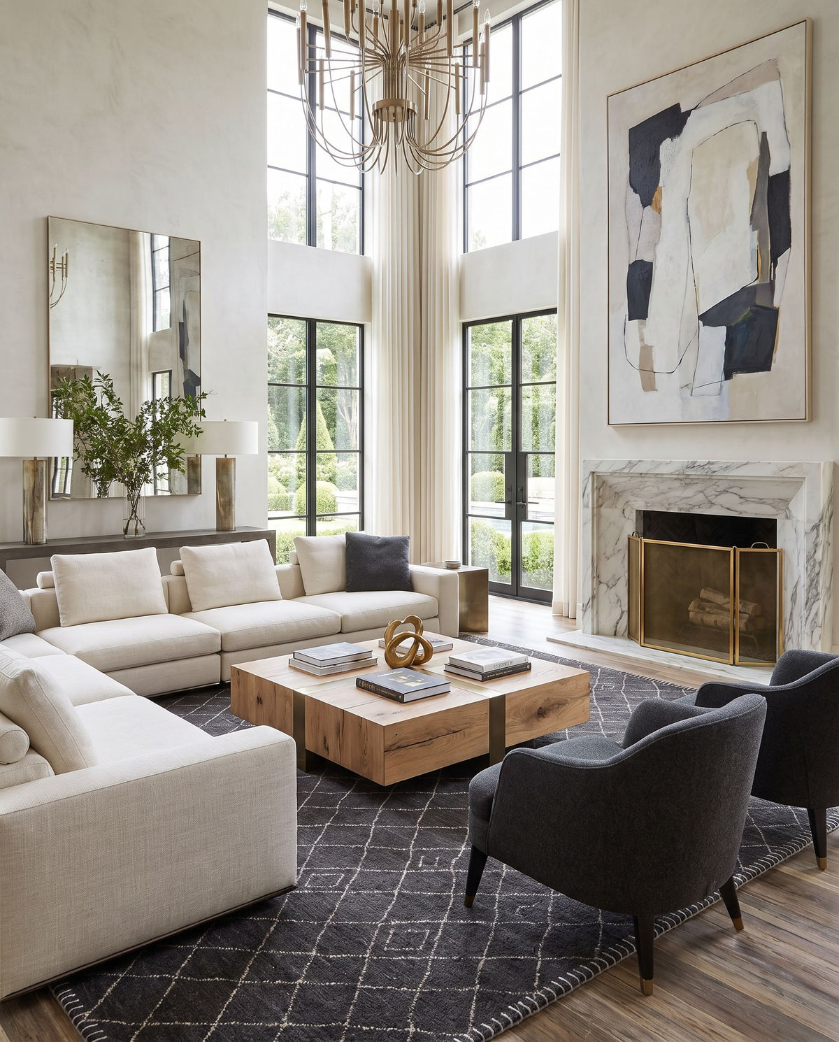 Arlequin ARQ-2301 Hand Loomed Rug as the centerpiece of a bright luxury living room — a hand loomed global area rug in black and ivory tones