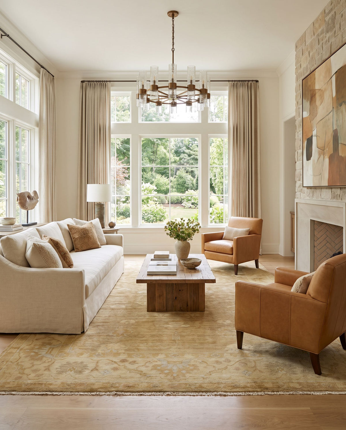 Antique ATQ-1001 Hand Knotted Rug styled in an elegant designer living room — hand knotted traditional area rug in mustard, tan, dusty pink and slate tones