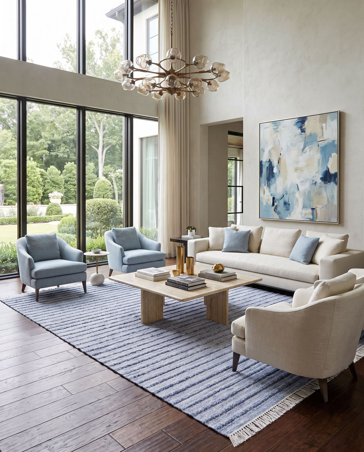Azalea AZA-2337 Hand Woven Rug as the centerpiece of a bright luxury living room — a hand woven modern area rug in blue, ivory and cream tones