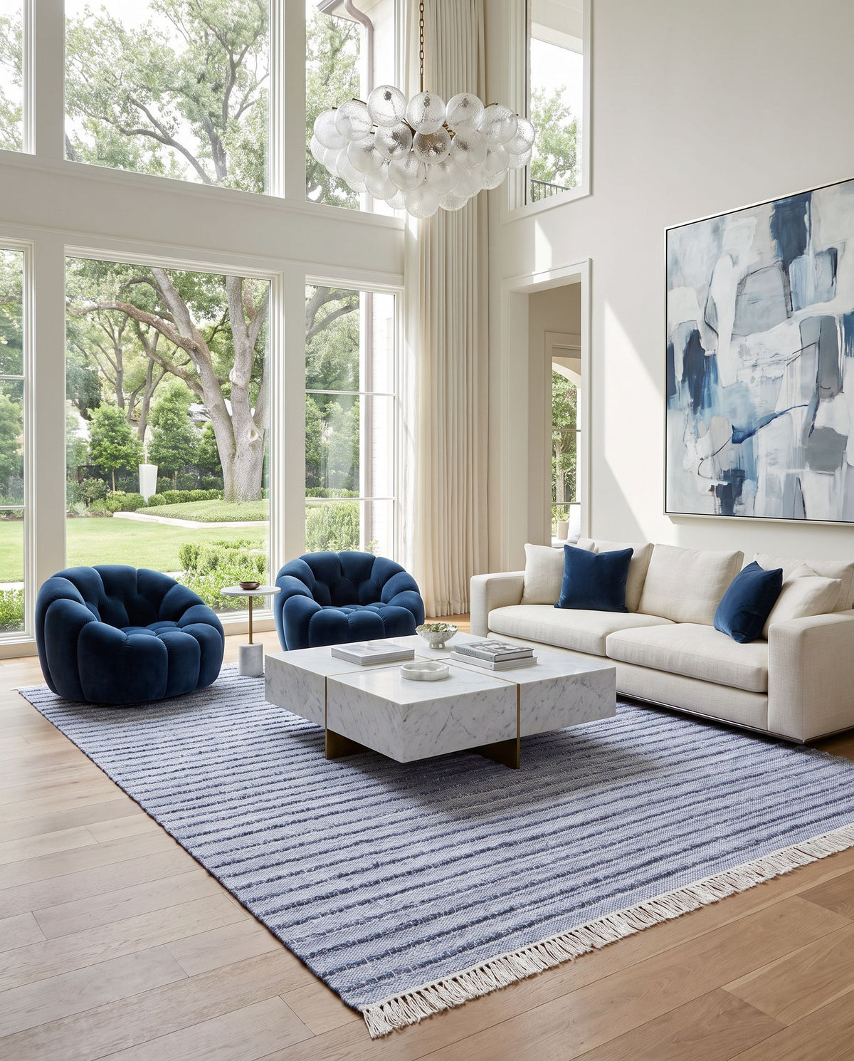 Azalea AZA-2337 Hand Woven Rug styled in an elegant designer living room — hand woven modern area rug in blue, ivory and cream tones