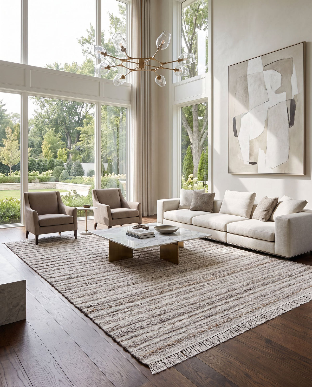 Azalea AZA-2338 Hand Woven Rug styled in an elegant designer living room — hand woven modern area rug in taupe, ivory, camel and dark brown tones