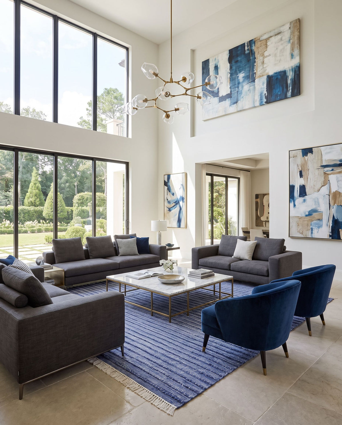 Azalea AZA-2339 Hand Woven Rug styled in an elegant designer living room — hand woven modern area rug in dark blue, denim, ivory and white tones
