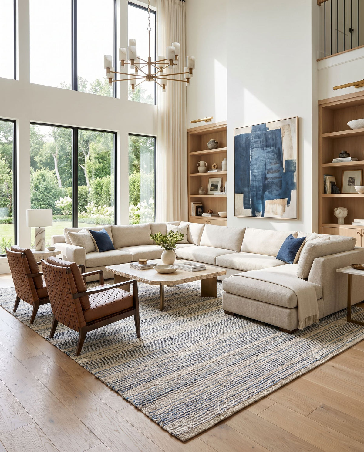 Bali BAL-2303 Hand Woven Rug as the centerpiece of a bright luxury living room — a hand woven cottage area rug in denim, blue, beige and cream tones