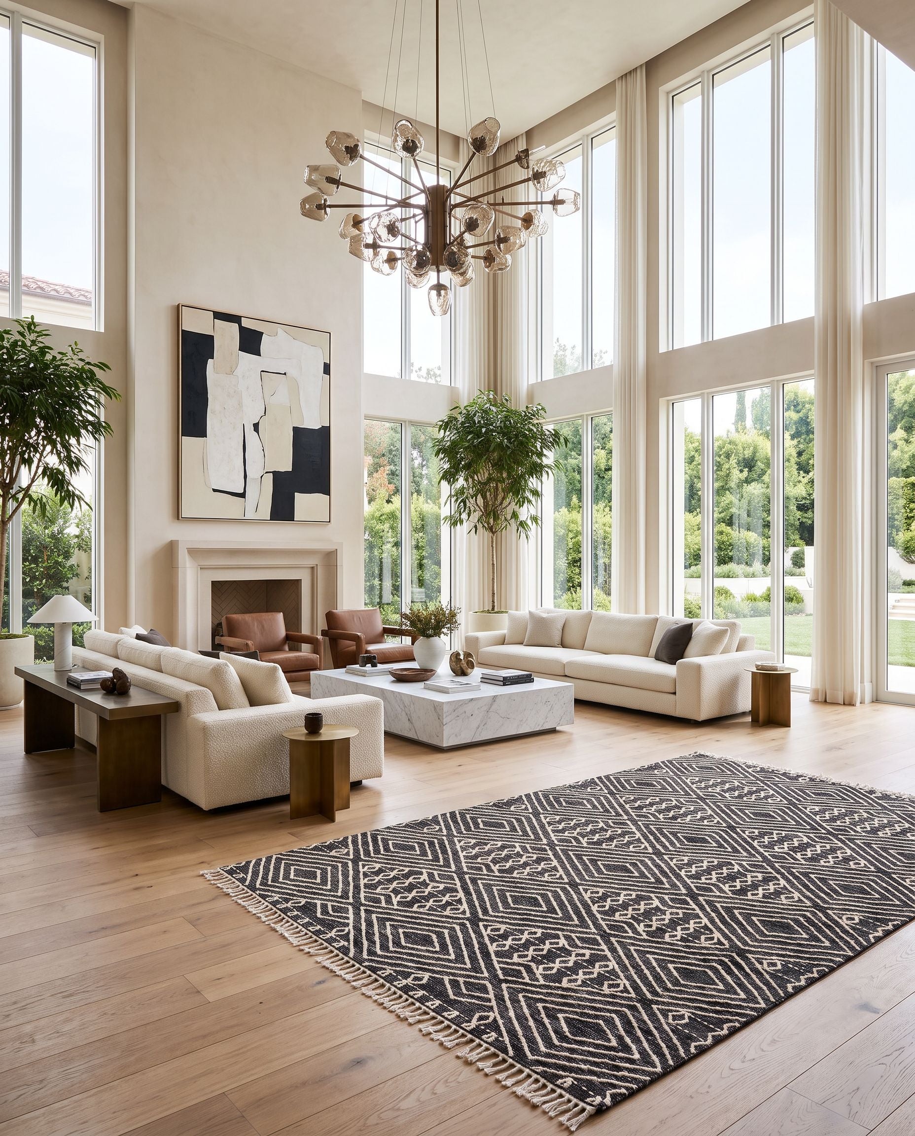Bedouin BDO-2300 Hand Woven Rug as the centerpiece of a bright luxury living room — a hand woven global area rug in black and cream tones