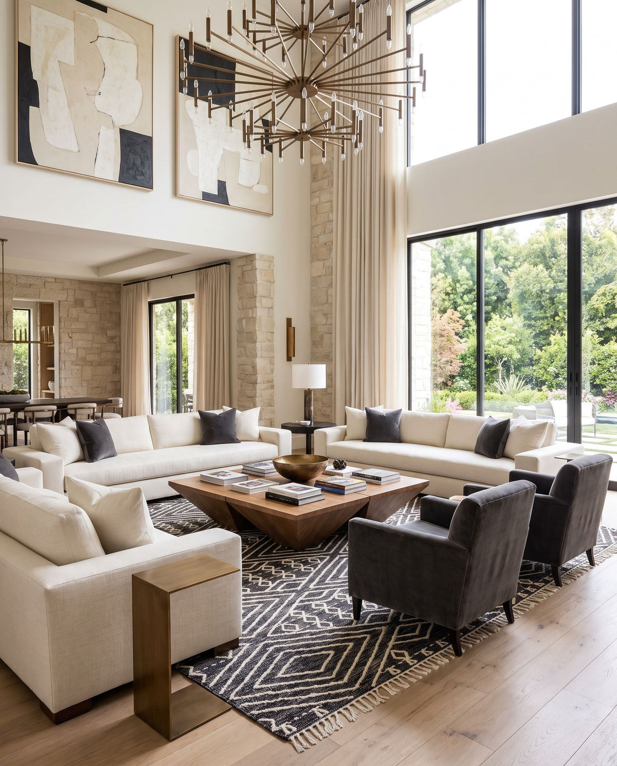 Bedouin BDO-2300 Hand Woven Rug styled in an elegant designer living room — hand woven global area rug in black and cream tones