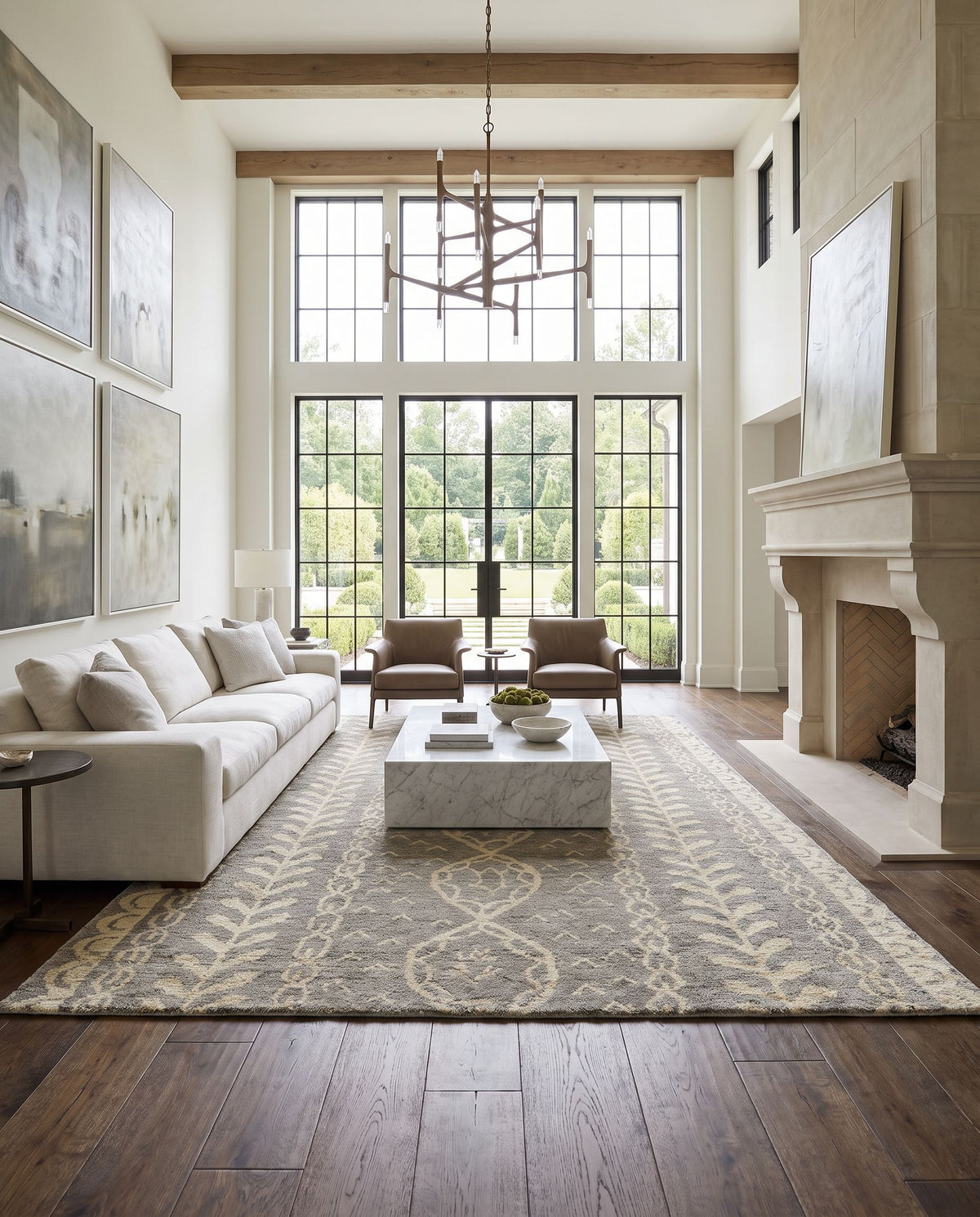 Bjorn BJR-1001 Hand Knotted Rug as the centerpiece of a bright luxury living room — a hand knotted global area rug in ivory, gray and brown tones
