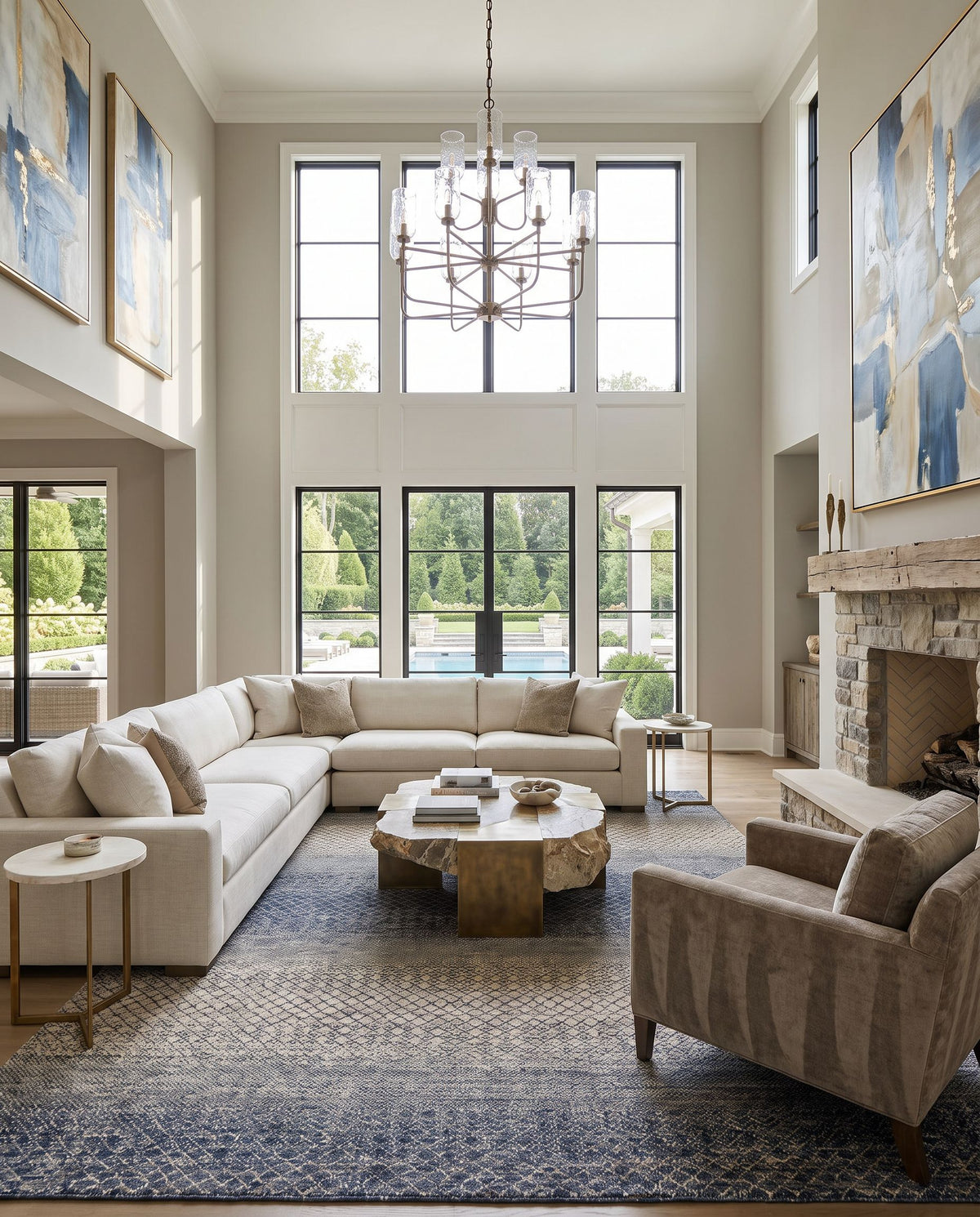 Bethesda BTD-2302 Hand Knotted Rug as the centerpiece of a bright luxury living room — a hand knotted global area rug in dark blue, denim, medium gray and light gray tones