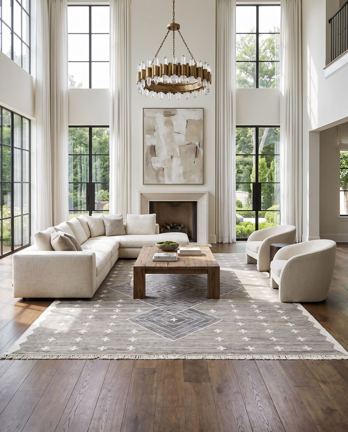 Bursa BUR-2301 Hand Woven Rug as the centerpiece of a bright luxury living room — a hand woven global area rug in gray, charcoal and cream tones