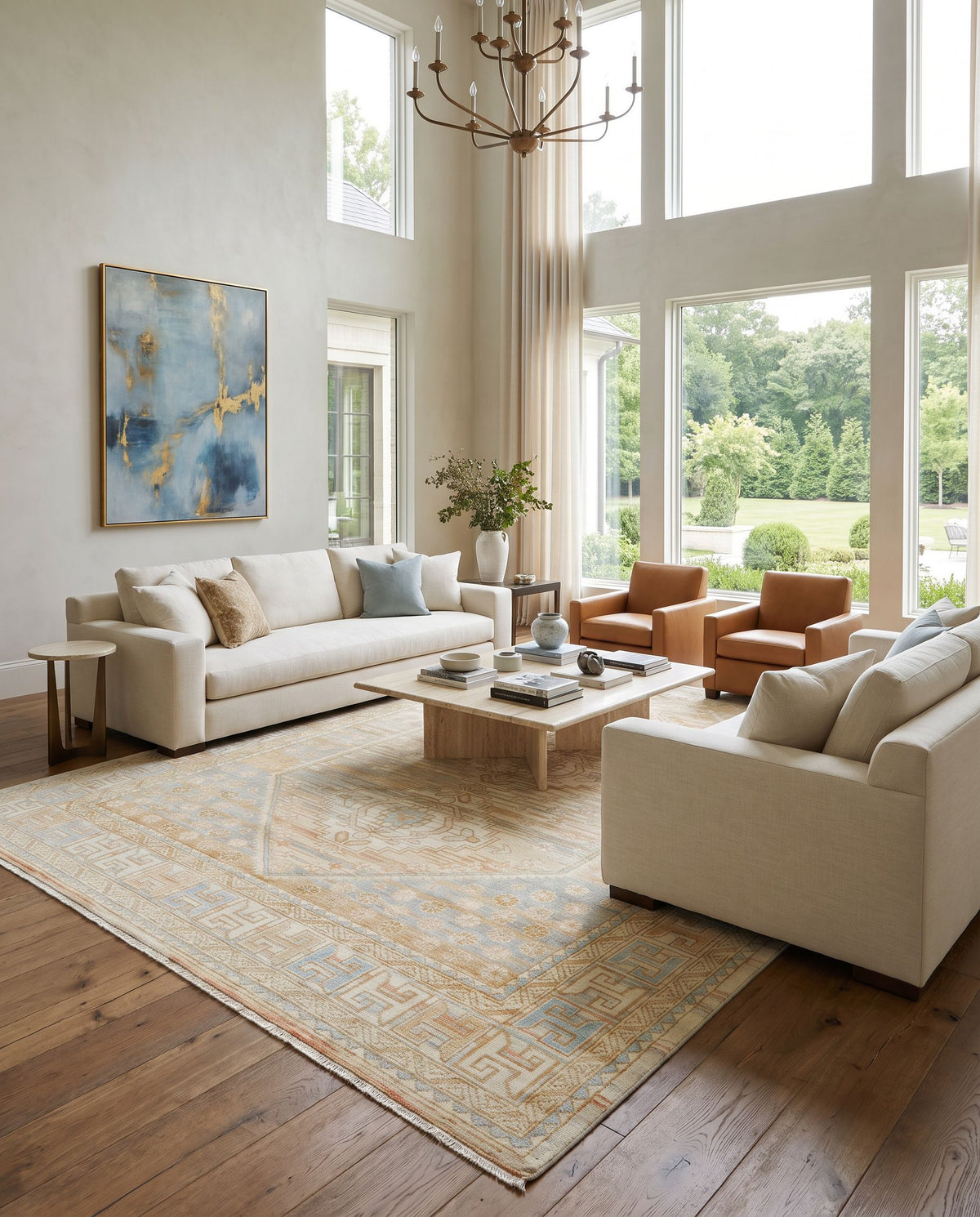 Bunyan BYN-2300 Hand Knotted Rug styled in an elegant designer living room — hand knotted traditional area rug in light beige, dusty pink, pale blue and mustard tones