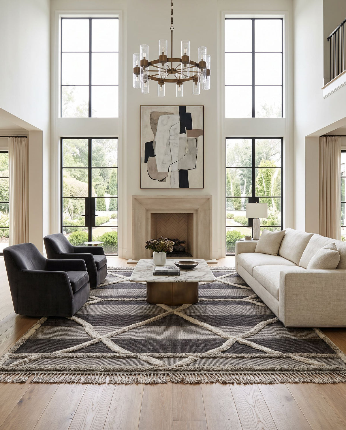 Cadiz CDZ-2304 Hand Knotted Rug styled in an elegant designer living room — hand knotted global area rug in gray, black and cream tones