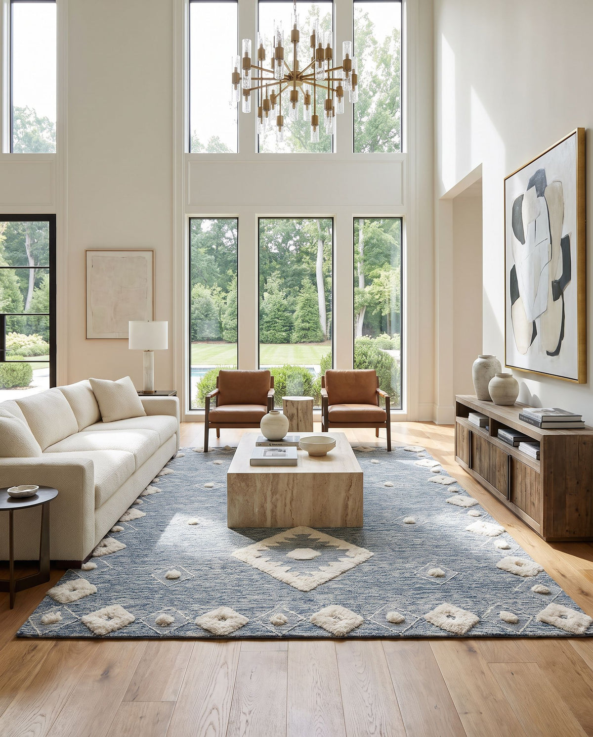 Cherokee CHK-2301 Hand Tufted Rug styled in an elegant designer living room — hand tufted transitional, bohemian area rug in cream and navy tones