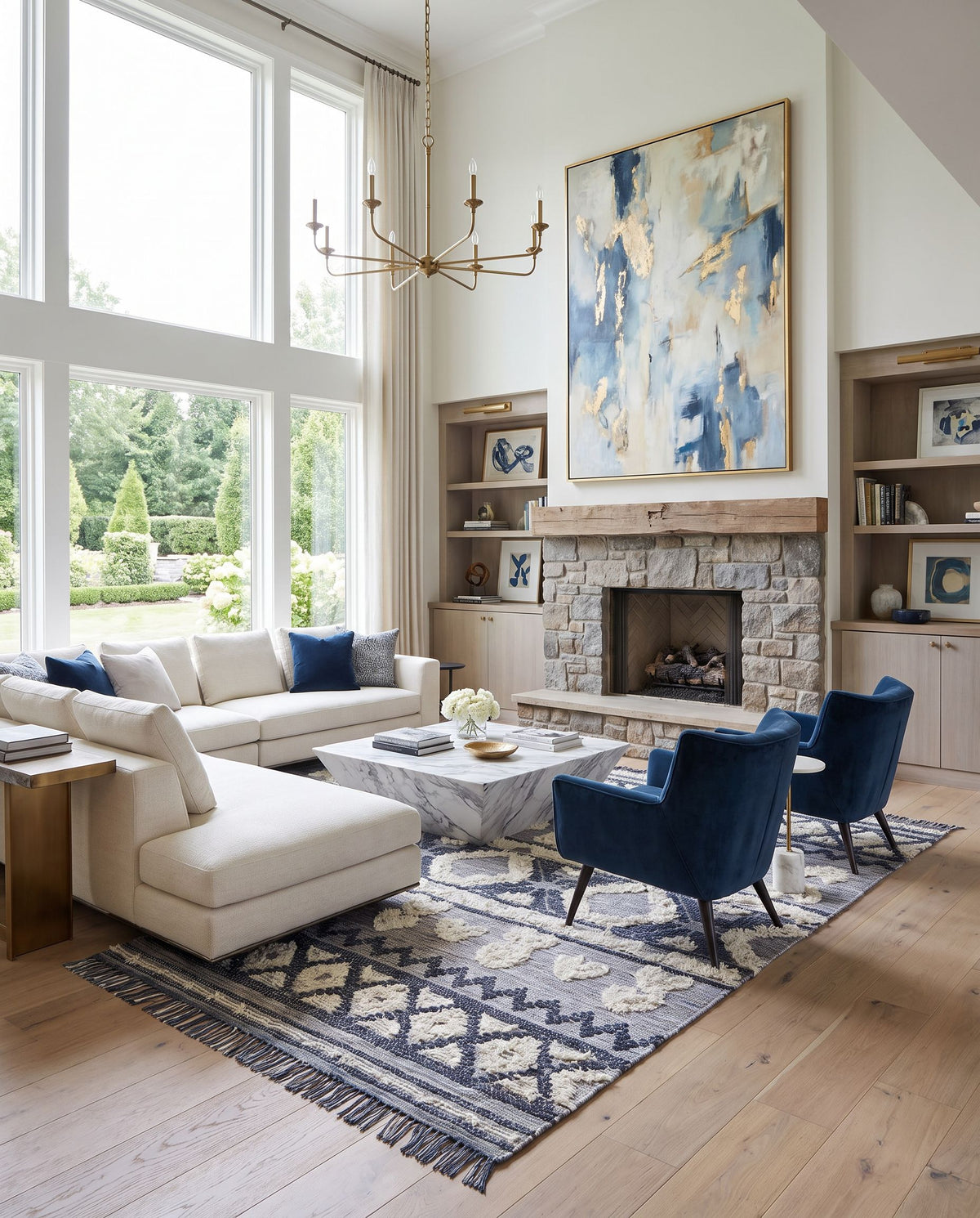 Cheyenne CHY-2307 Hand Woven Rug as the centerpiece of a bright luxury living room — a hand woven global area rug in ink blue, dark blue, light blue and brown tones