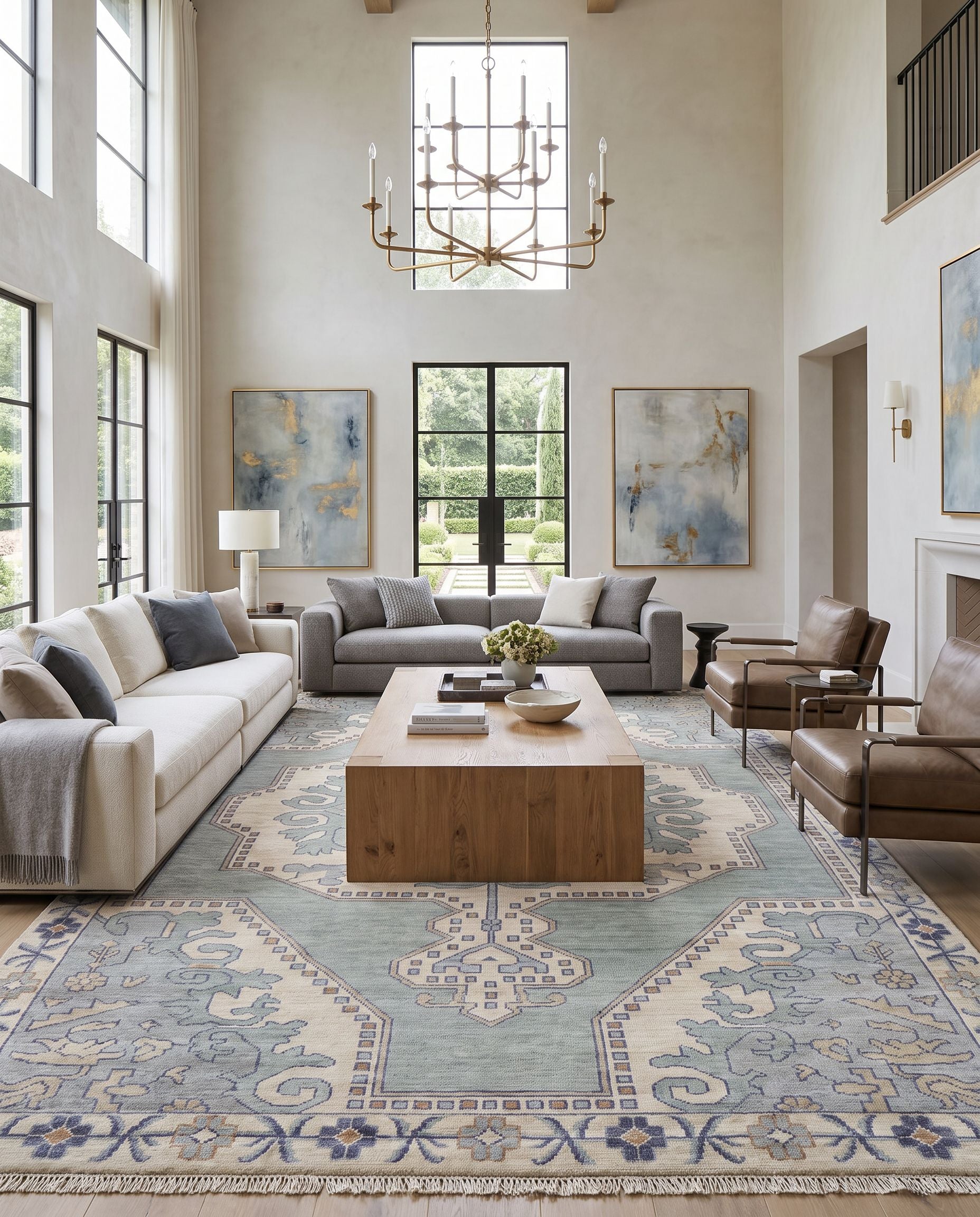 Cappadocia CPP-5031 Hand Knotted Rug as the centerpiece of a bright luxury living room — a hand knotted traditional area rug in denim, ivory, light sage and olive tones