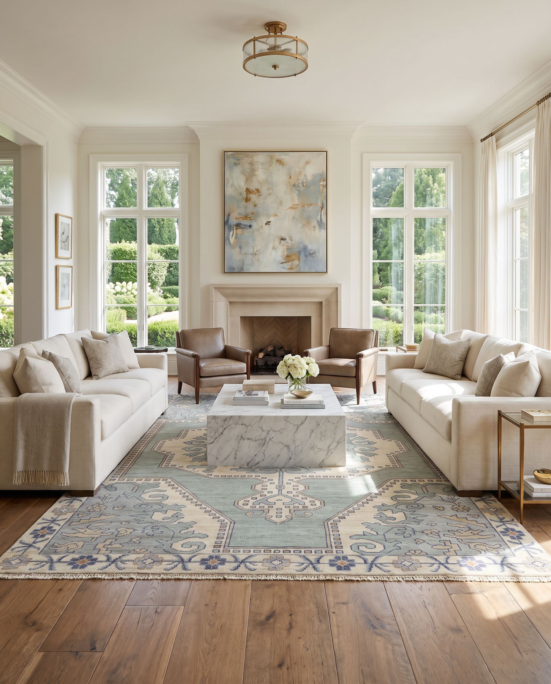 Cappadocia CPP-5031 Hand Knotted Rug styled in an elegant designer living room — hand knotted traditional area rug in denim, ivory, light sage and olive tones