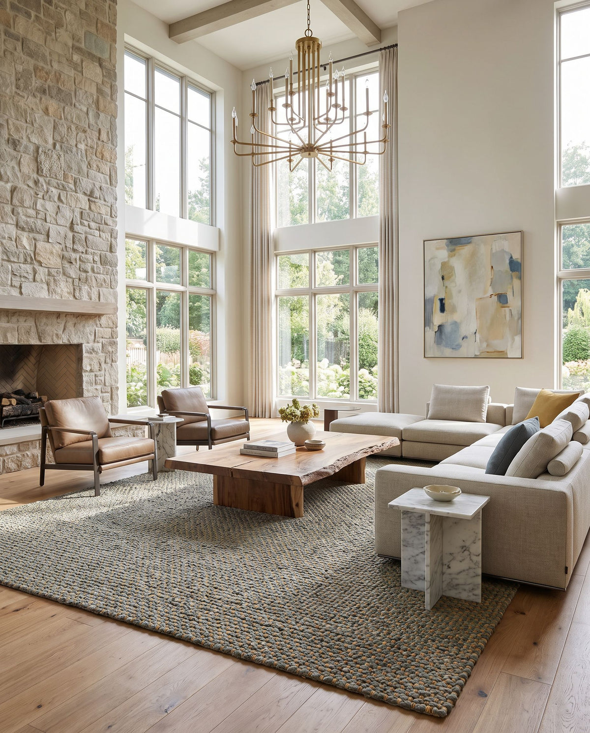 Curacao CUR-2302 Hand Woven Rug as the centerpiece of a bright luxury living room — a hand woven modern area rug in sky blue, sandy beige and slate gray tones