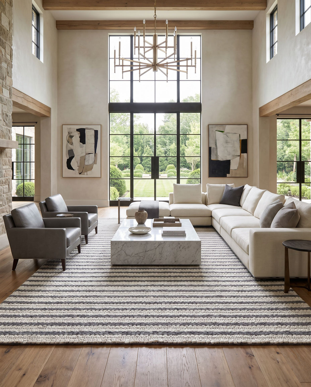 Empoli EPO-2302 Hand Woven Rug as the centerpiece of a bright luxury living room — a hand woven cottage area rug in cream, charcoal and black tones