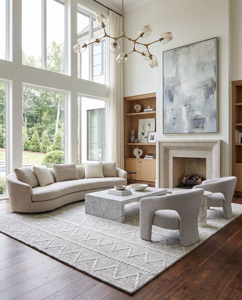 Empoli EPO-2307 Hand Woven Rug as the centerpiece of a bright luxury living room — a hand woven cottage area rug in medium gray tones