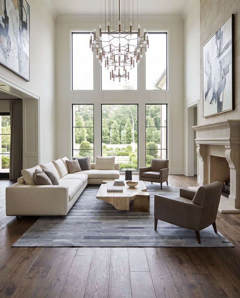 Elvira ERA-1000 Hand Crafted Rug as the centerpiece of a bright luxury living room — a hand crafted rustic area rug in slate and charcoal tones