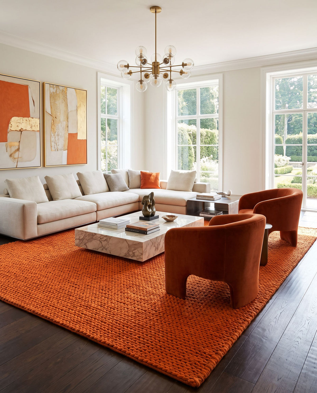 Fargo FARGO-109 Hand Woven Rug styled in an elegant designer living room — hand woven cottage area rug in burnt orange tones