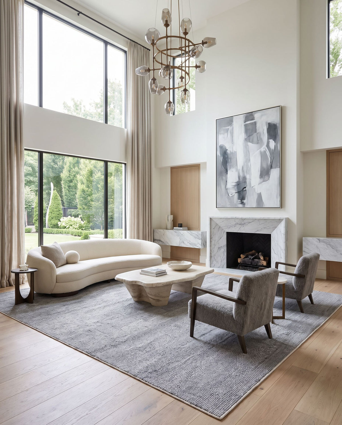 Floria FLI-2301 Hand Woven Rug as the centerpiece of a bright luxury living room — a hand woven modern area rug in off-white and light gray tones