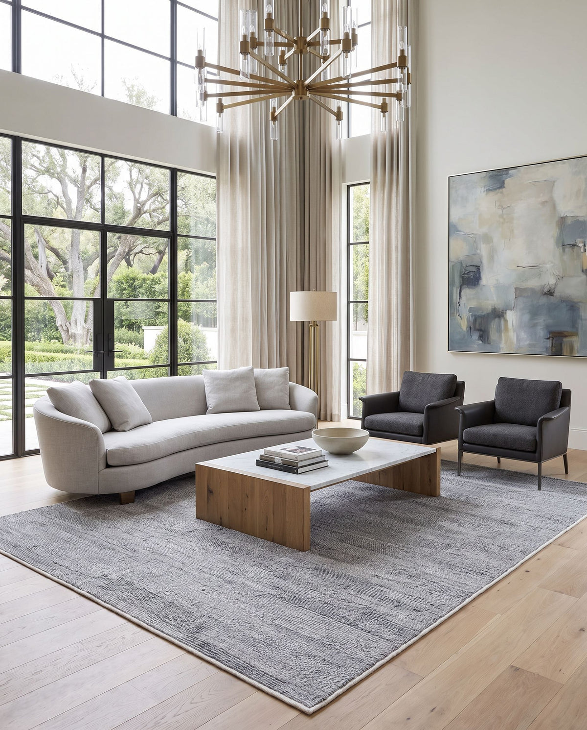 Floria FLI-2301 Hand Woven Rug styled in an elegant designer living room — hand woven modern area rug in off-white and light gray tones