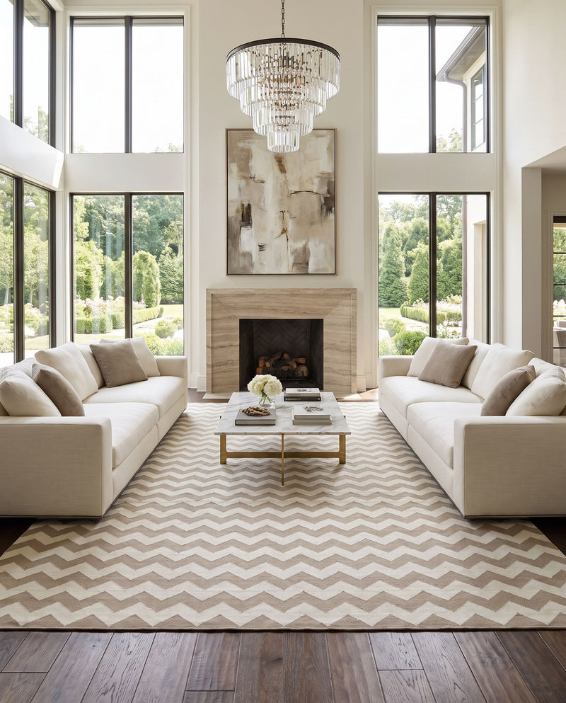 Frontier FT-289 Hand Woven Rug as the centerpiece of a bright luxury living room — a hand woven modern area rug in cream and medium gray tones