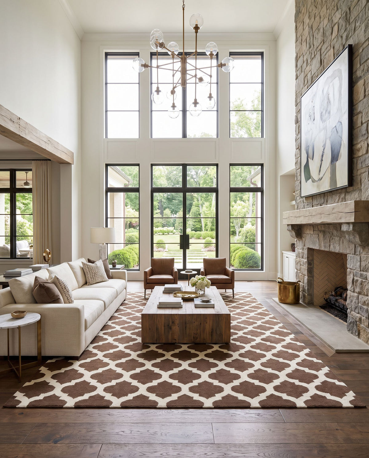 Frontier FT-541 Hand Woven Rug as the centerpiece of a bright luxury living room — a hand woven modern area rug in brown and tan tones