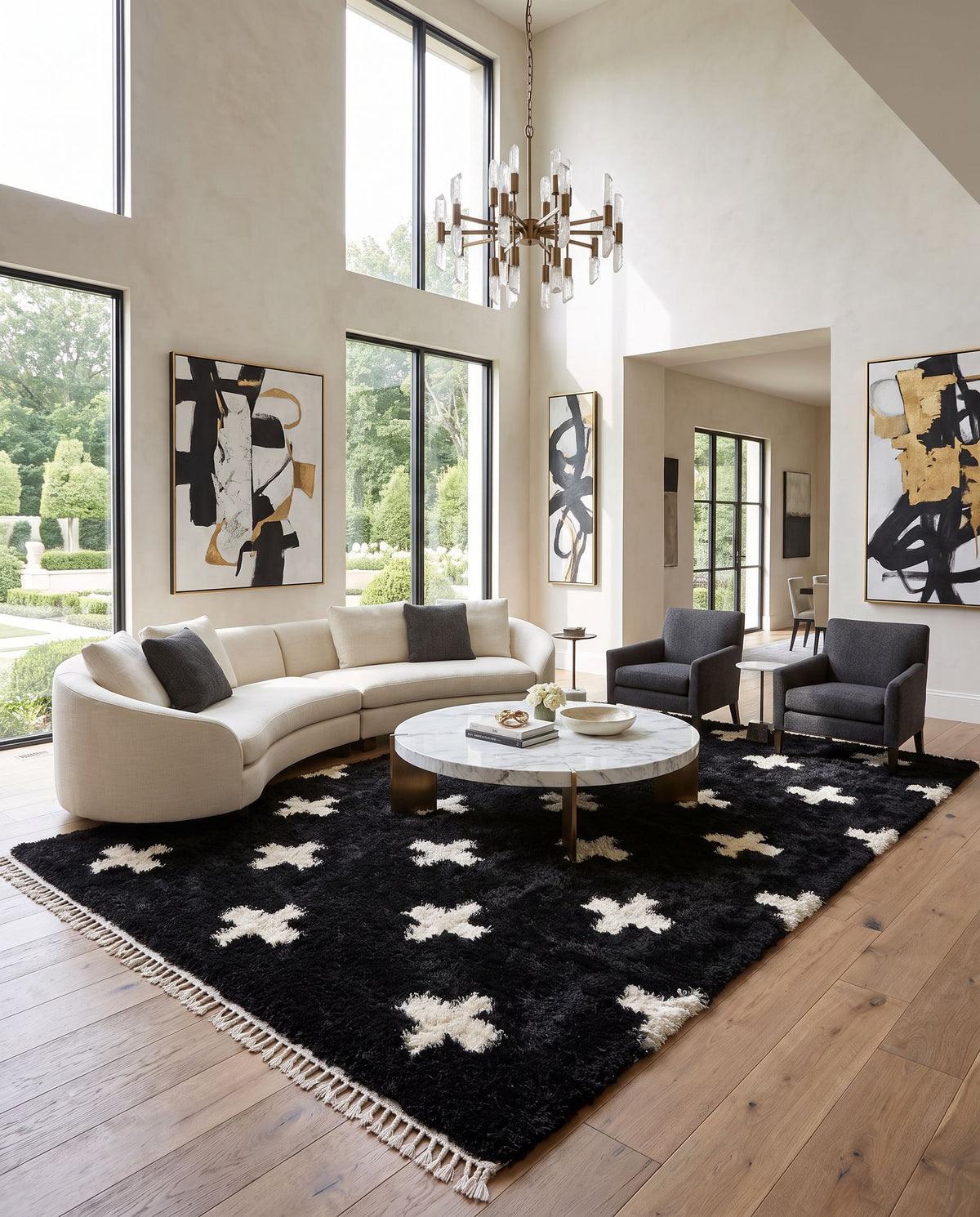 Gibraltar GIB-2303 Hand Tufted Rug as the centerpiece of a bright luxury living room — a hand tufted modern area rug in black and ivory tones