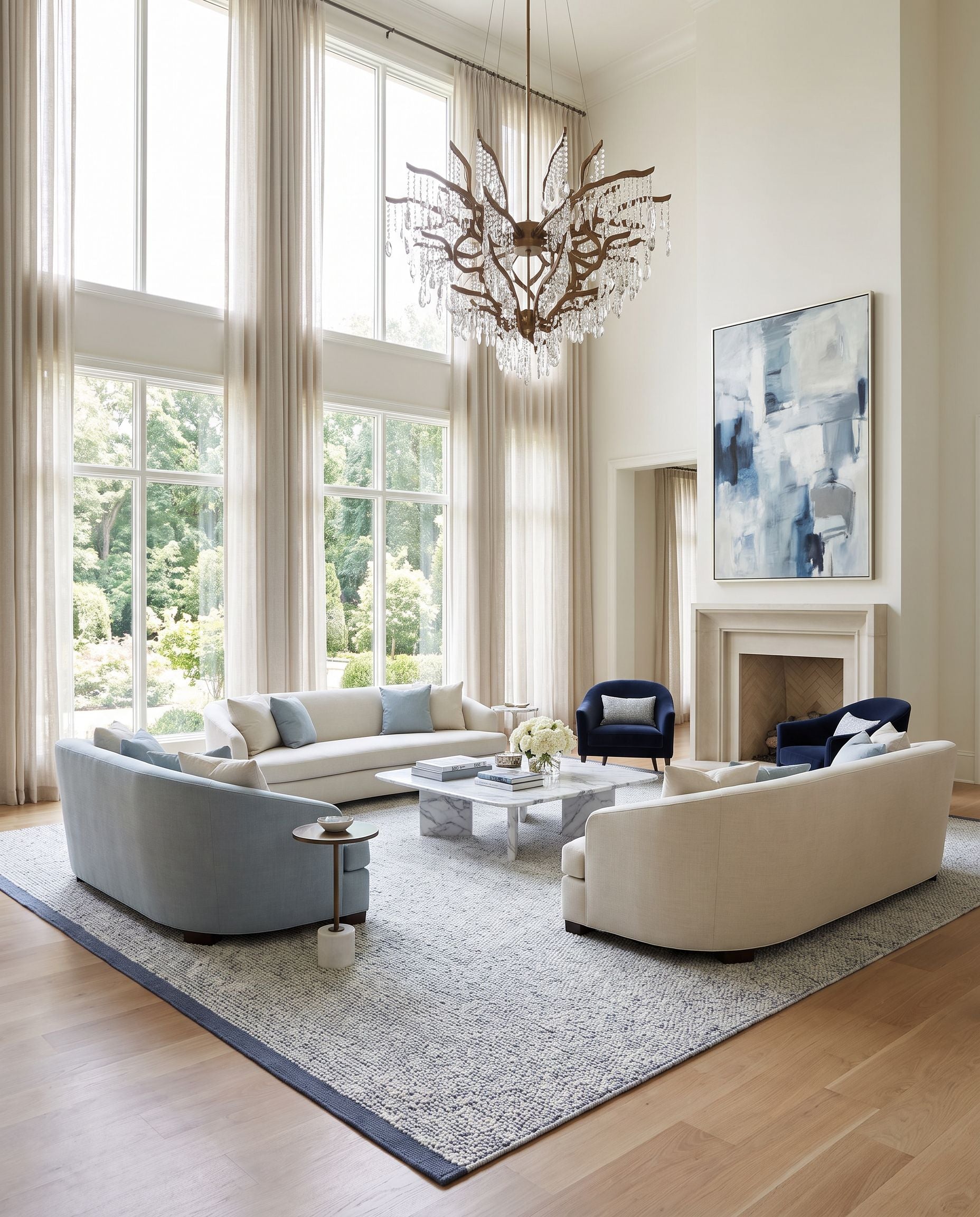 Jadie JDE-2304 Hand Woven Rug as the centerpiece of a bright luxury living room — a hand woven cottage area rug in slate blue, dove gray and ivory tones