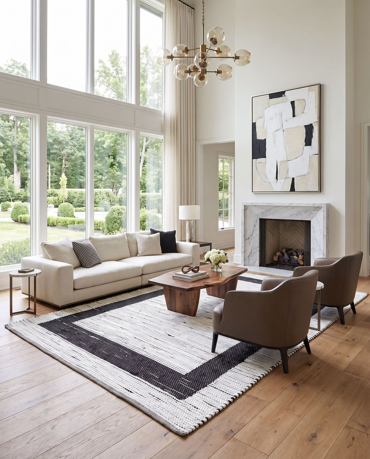 Jean JEA-2303 Hand Woven Rug as the centerpiece of a bright luxury living room — a hand woven modern area rug in ivory and black tones