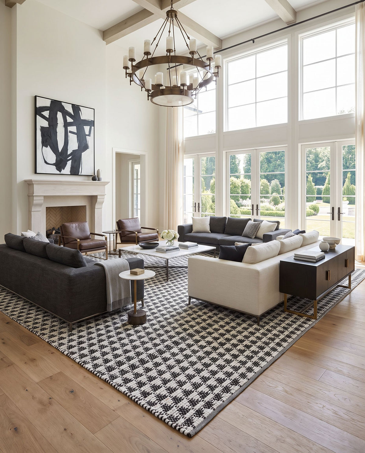 Jean JEA-2311 Hand Woven Rug as the centerpiece of a bright luxury living room — a hand woven modern area rug in ivory and black tones