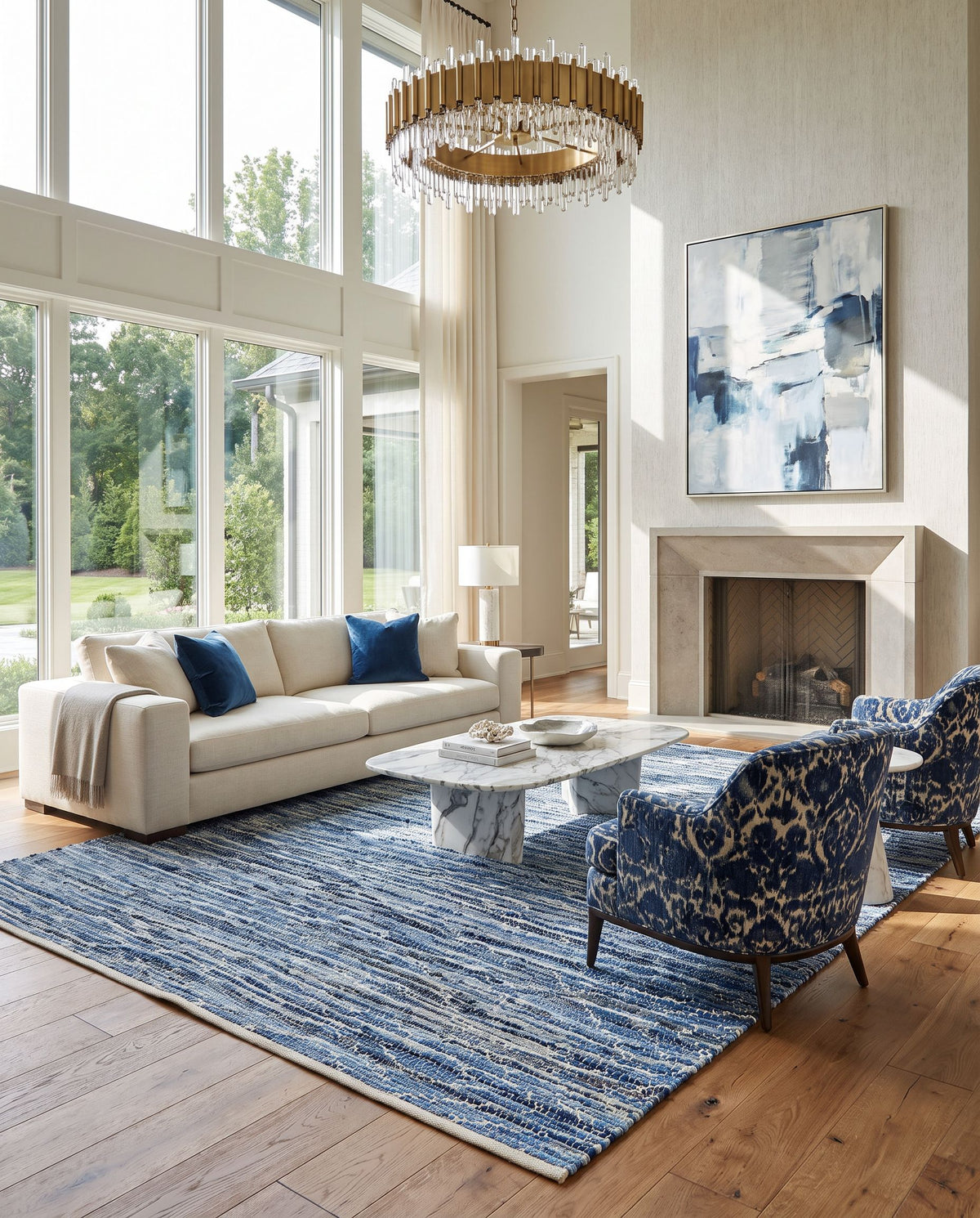 Jean JEA-2313 Hand Woven Rug as the centerpiece of a bright luxury living room — a hand woven modern area rug in tan, beige, dark blue and blue tones