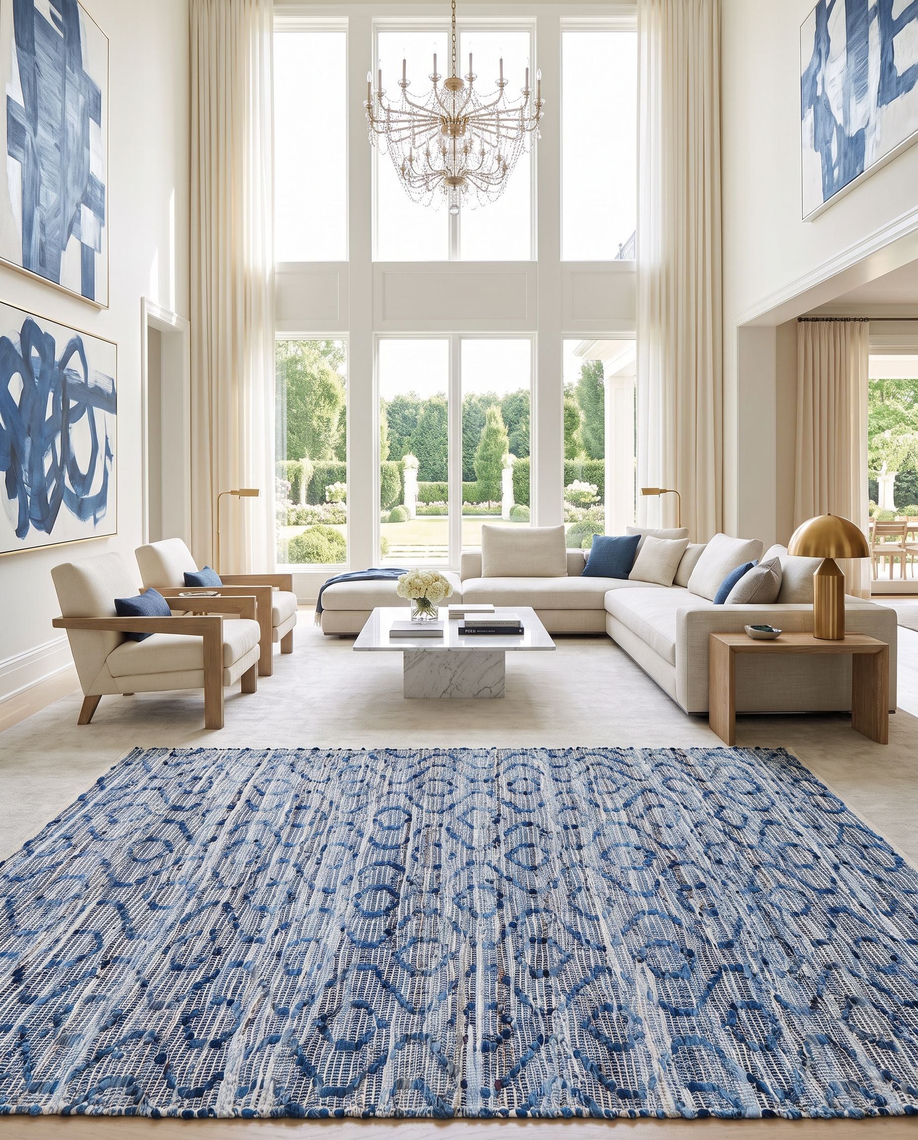 Jean JEA-2314 Hand Woven Rug as the centerpiece of a bright luxury living room — a hand woven modern area rug in tan, beige, dark blue and blue tones