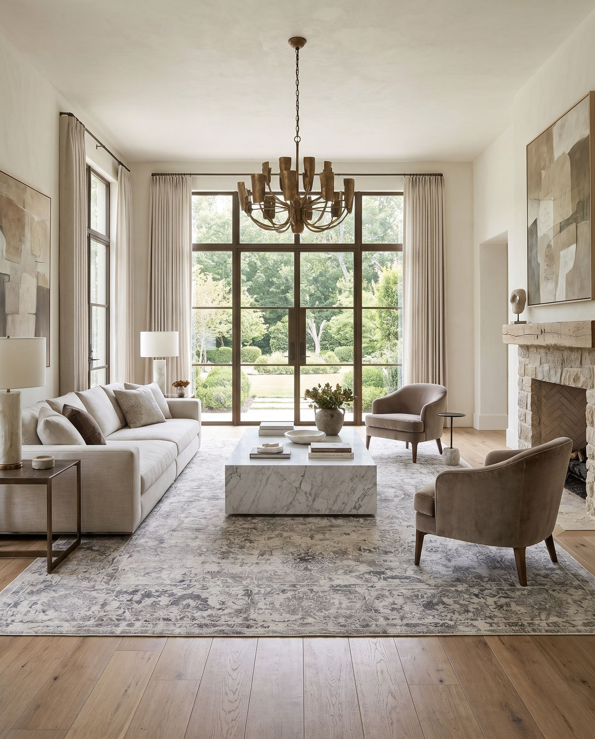 Jordan JOR-2304 Hand Loomed Rug styled in an elegant designer living room — hand loomed traditional area rug in medium gray, light gray, light beige and charcoal tones