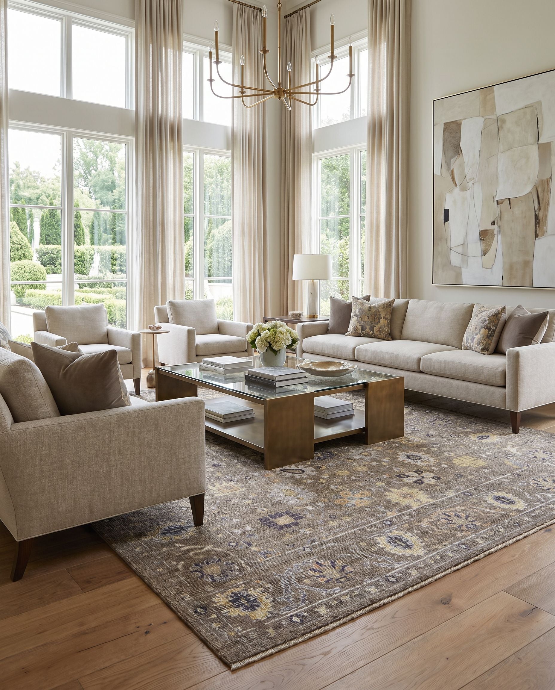 Kushal KUS-2305 Hand Knotted Rug styled in an elegant designer living room — hand knotted traditional area rug in charcoal, pale blue, wheat and dusty coral tones