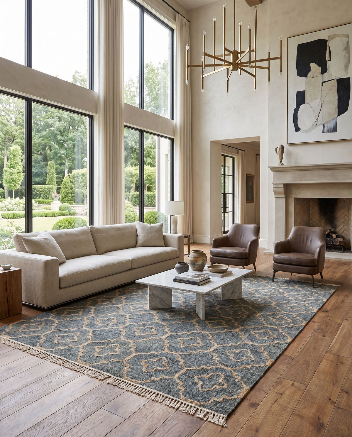 Laural LRL-6010 Hand Woven Rug as the centerpiece of a bright luxury living room — a hand woven modern area rug in medium gray, tan and cream tones
