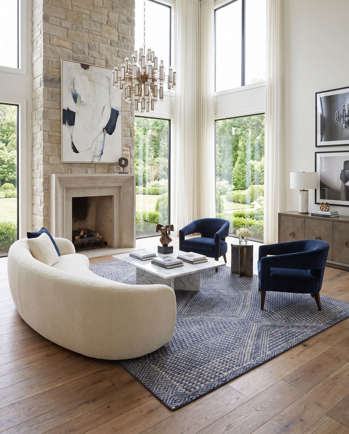 Livorno LVN-2304 Hand Knotted Rug as the centerpiece of a bright luxury living room — a hand knotted global area rug in dark blue, white and charcoal tones