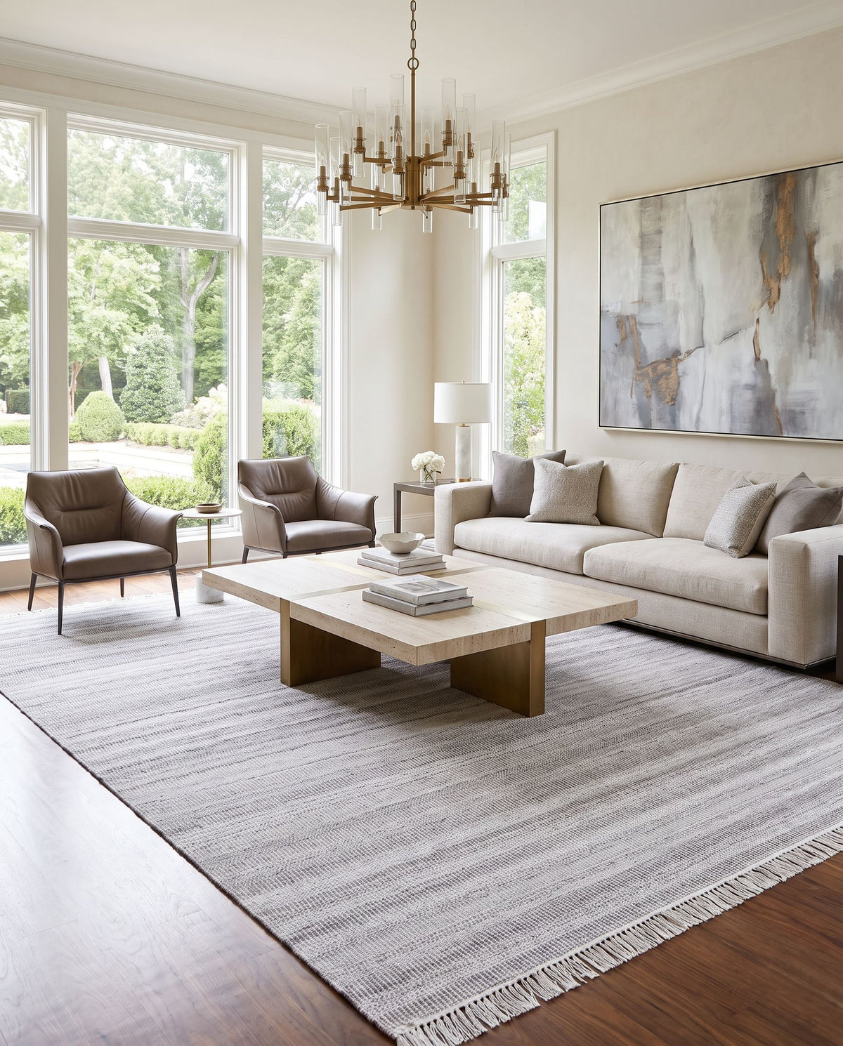 Lily LYI-2301 Hand Woven Rug styled in an elegant designer living room — hand woven modern area rug in cream, dark brown, light slate and off-white tones