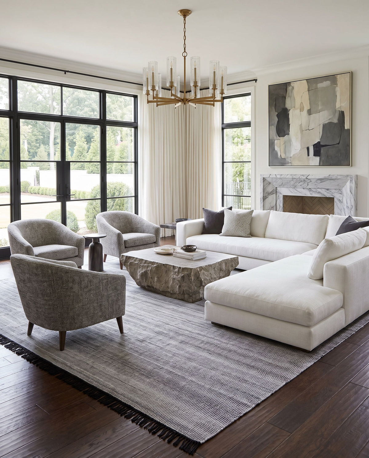 Lily LYI-2303 Hand Woven Rug styled in an elegant designer living room — hand woven modern area rug in black, charcoal, gray and light beige tones