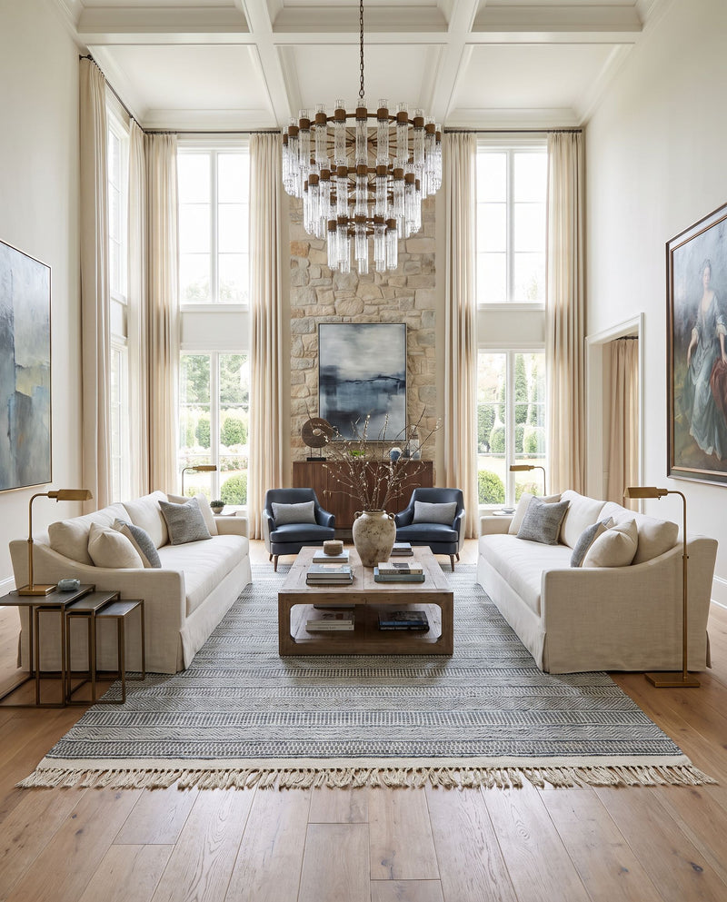 Lily LYI-2306 Hand Woven Rug as the centerpiece of a bright luxury living room — a hand woven modern area rug in beige, charcoal, bright blue and medium brown tones