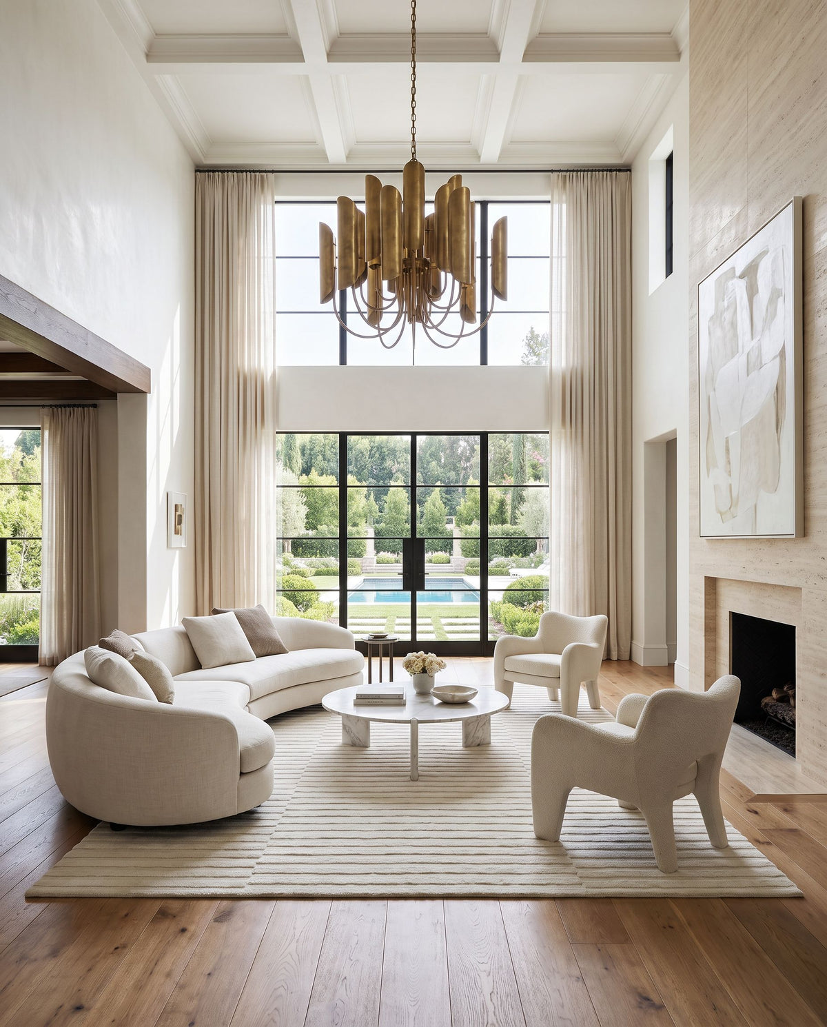 Mystique M-5482 Hand Loomed Rug as the centerpiece of a bright luxury living room — a hand loomed modern area rug in ivory, cream and pearl tones