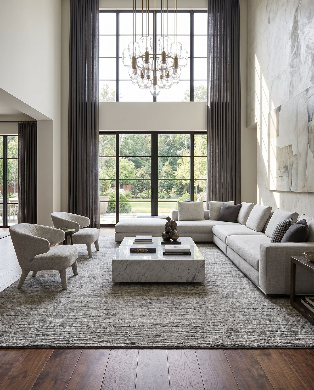 Malaga MAG-2304 Hand Knotted Rug as the centerpiece of a bright luxury living room — a hand knotted modern area rug in ink blue, denim, light sage and light olive tones