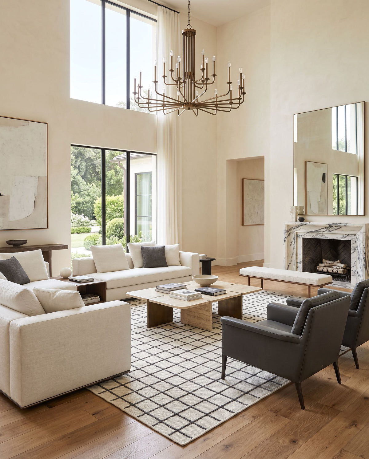 Marcela MCL-2302 Hand Woven Rug as the centerpiece of a bright luxury living room — a hand woven cottage area rug in ivory and charcoal tones