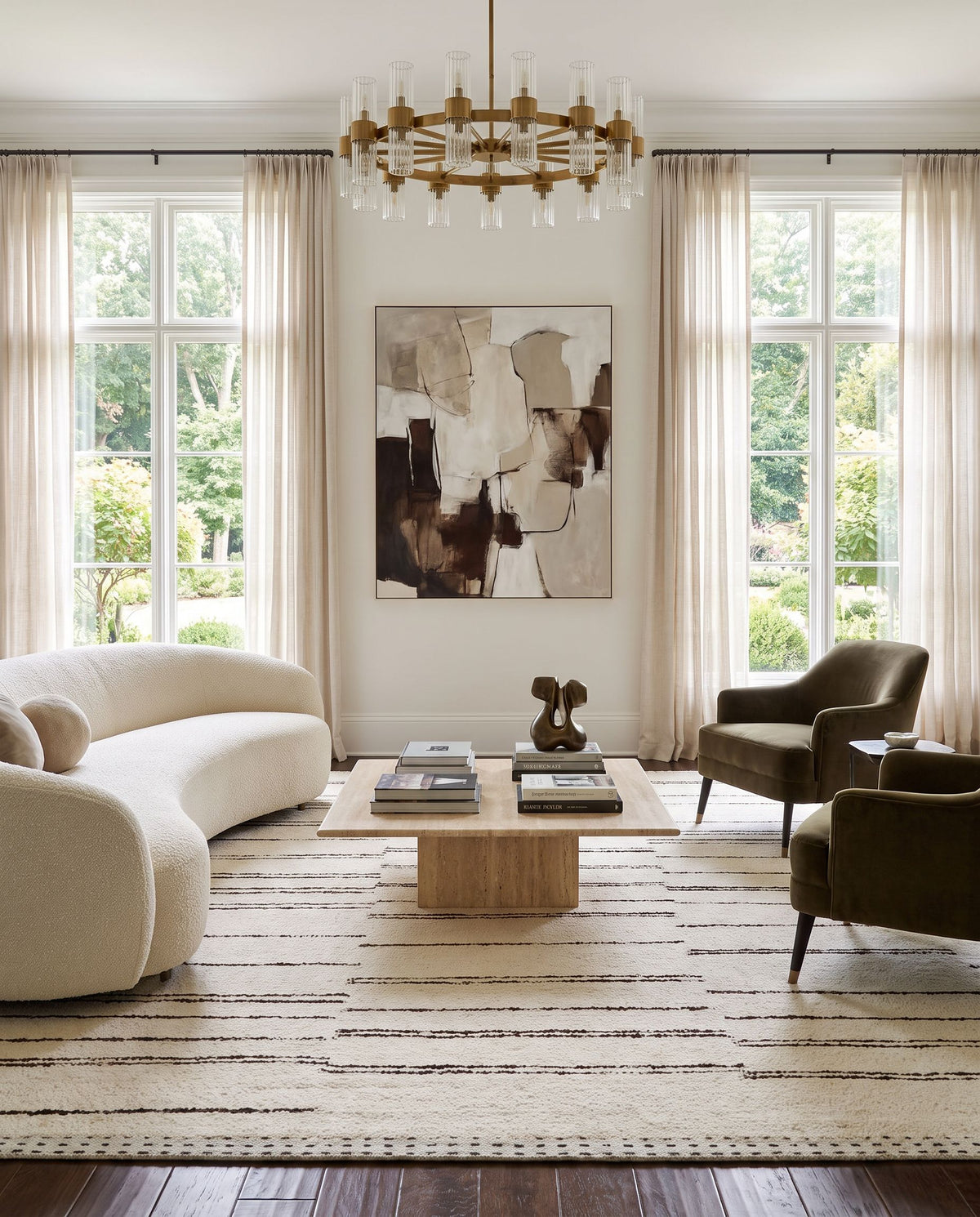 Machu Picchu MCU-1005 Hand Woven Rug styled in an elegant designer living room — hand woven global area rug in cream, dark brown and black tones