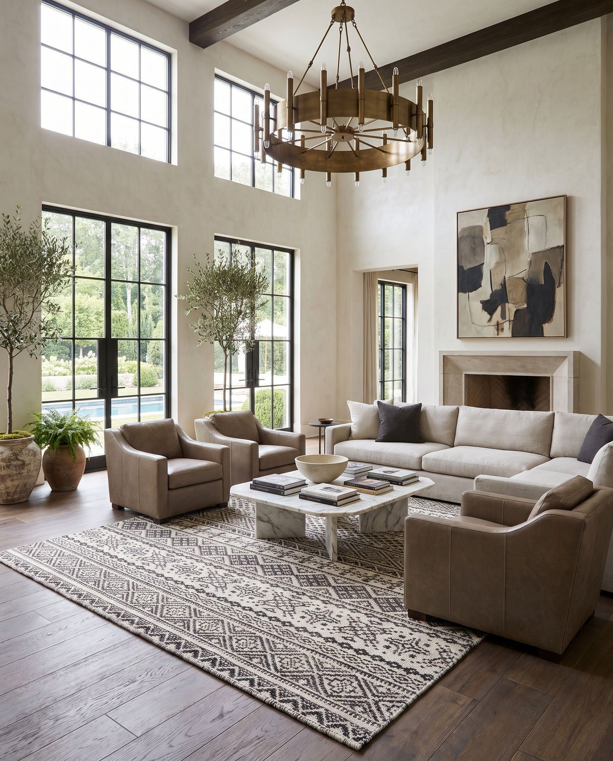 Mardin MDI-2313 Hand Woven Rug as the centerpiece of a bright luxury living room — a hand woven global area rug in black, gray and cream tones