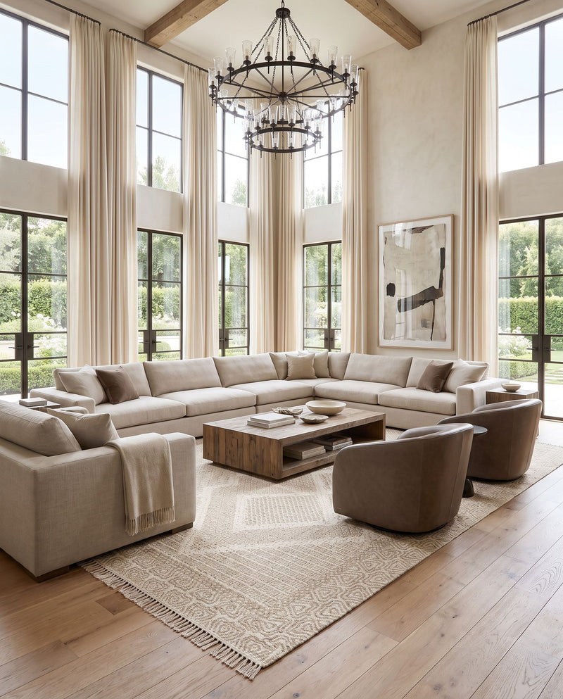 Mardin MDI-2314 Hand Woven Rug as the centerpiece of a bright luxury living room — a hand woven cottage area rug in beige and medium gray tones