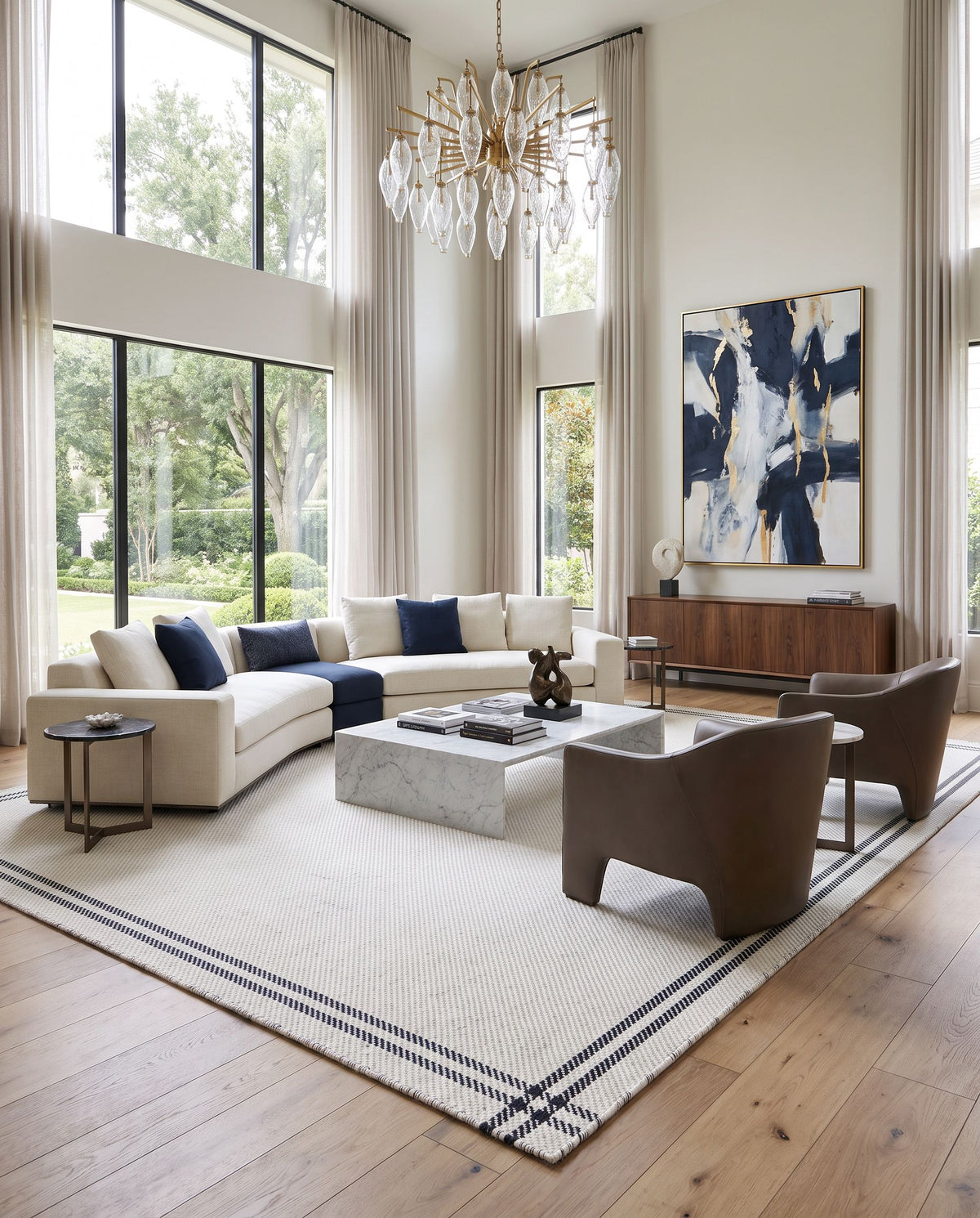 Mardin MDI-2333 Hand Woven Rug as the centerpiece of a bright luxury living room — a hand woven cottage area rug in ivory, charcoal and slate tones
